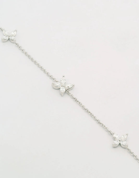 Pulsera de flores de diamantes en oro blanco de 18k