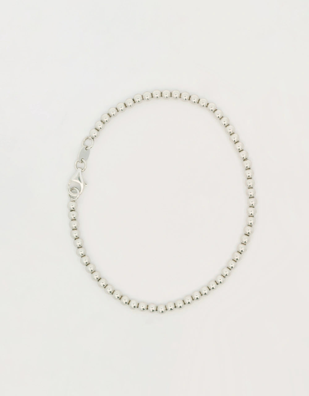 Pulsera de bolitas en oro blanco de 18k