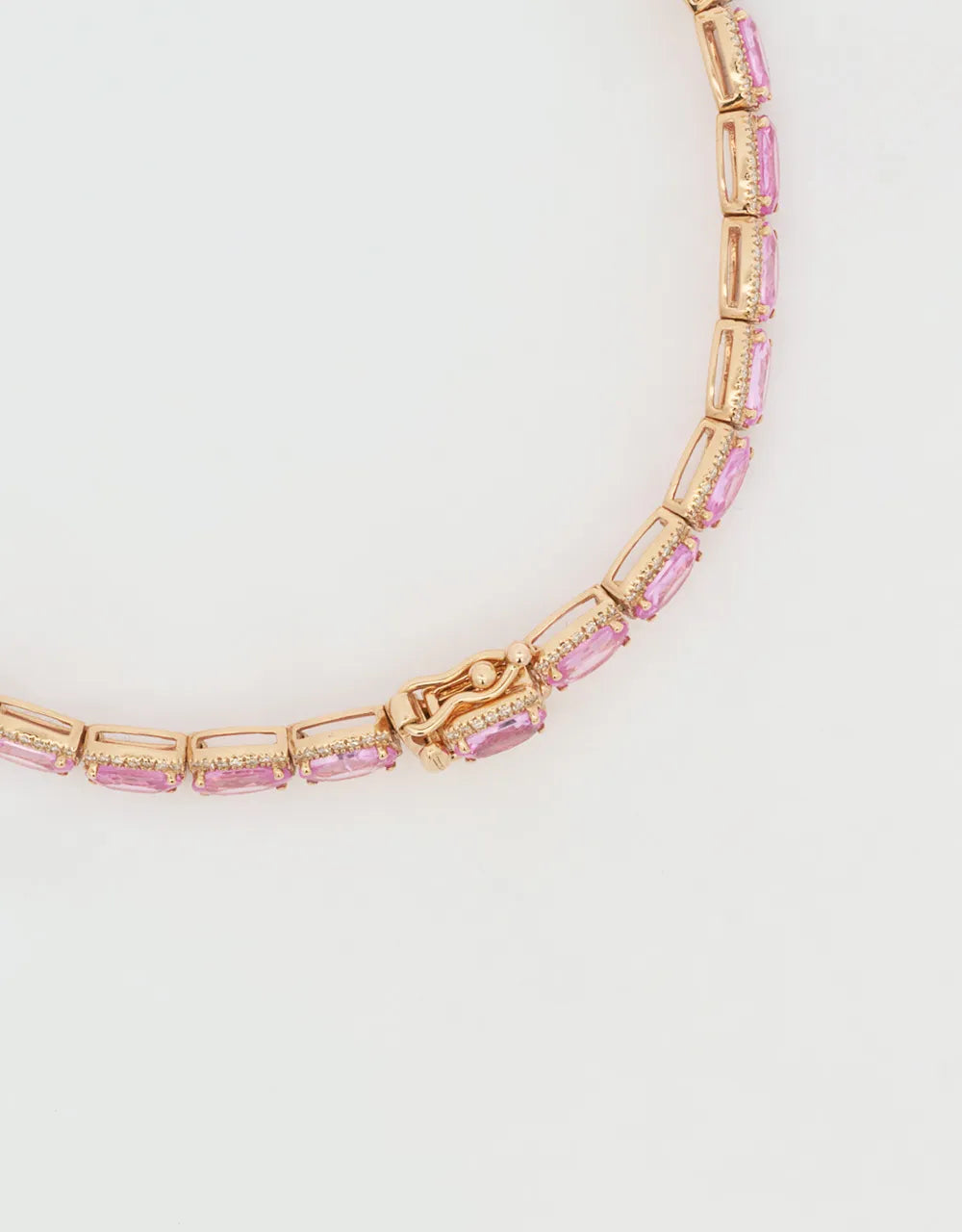 Pulsera de zafiros rosados con diamantes en oro rojo de 18k