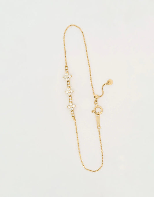 Pulsera barra cruces de diamantes en oro amarillo de 18k