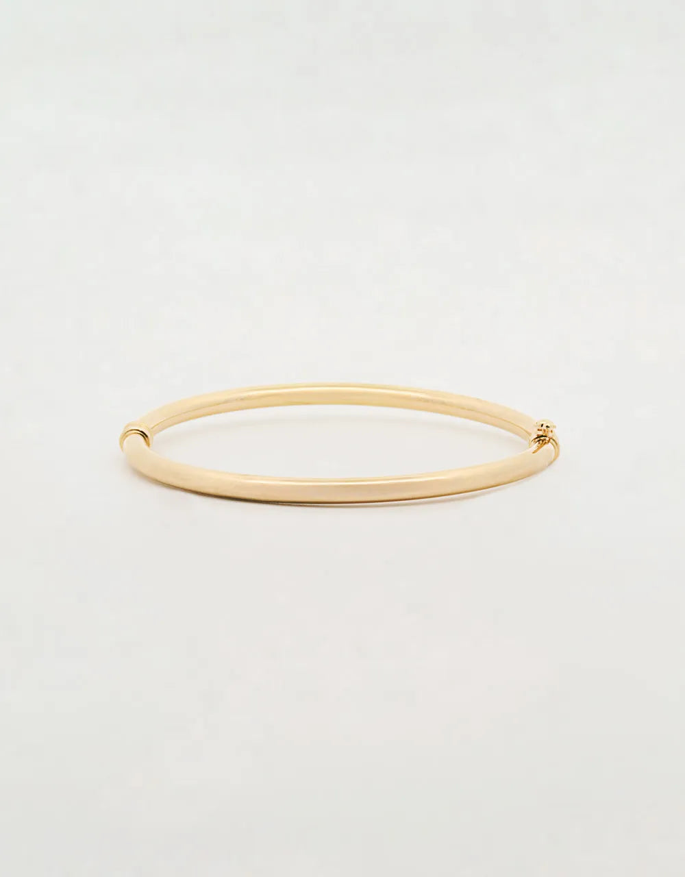 Pulsera brazalete liso en oro amarillo de 18k