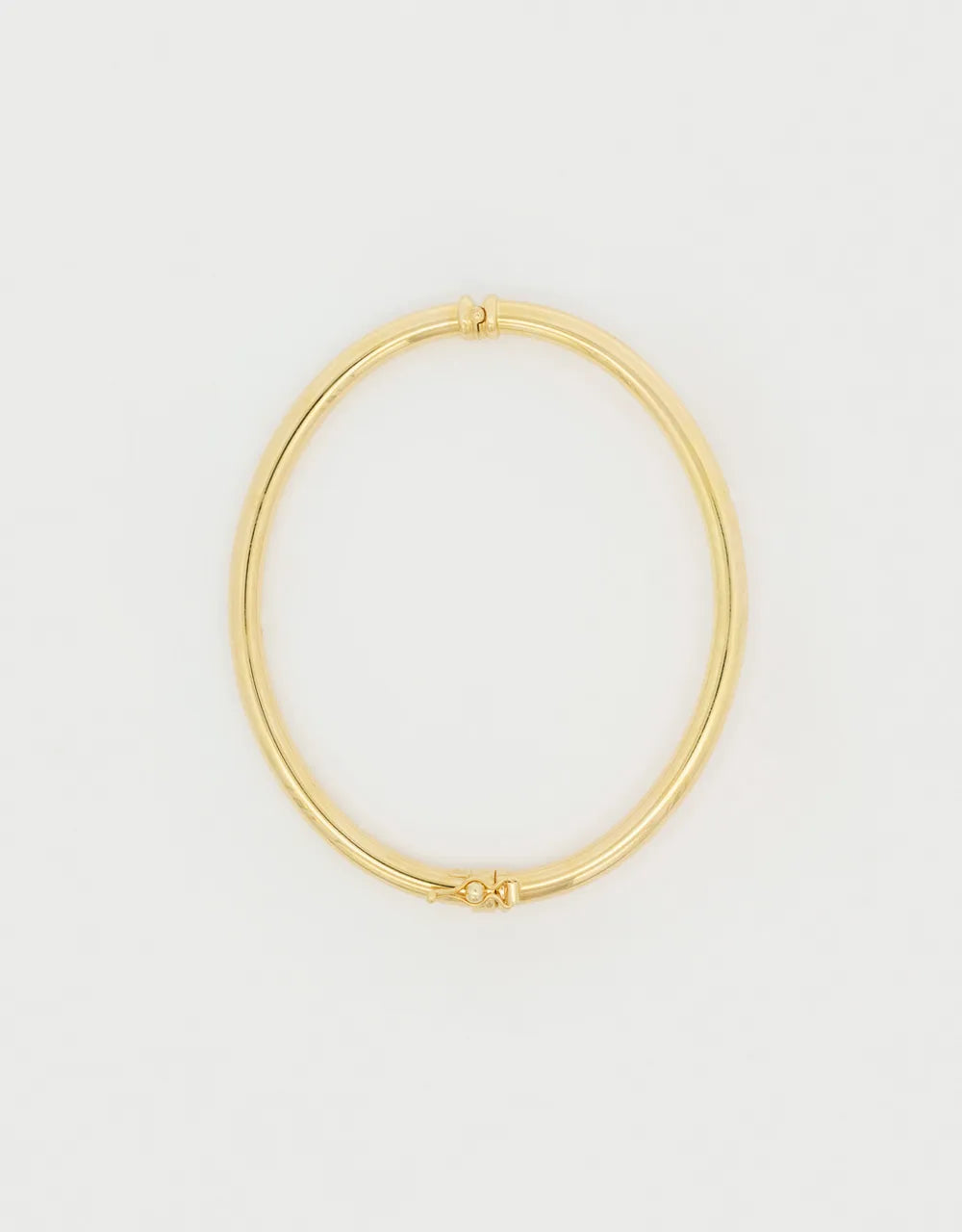 Pulsera brazalete liso en oro amarillo de 18k